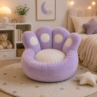Coussin de sol rose en peluche forme patte de chat