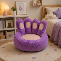 Coussin de sol rose en peluche forme patte de chat